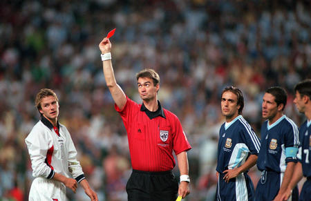 World Cup 1998 Finals, St. Etienne, France. 30th June, 1998.  England 2 v Argentina 2 (Argentina win 4-3 on penalties). Referee Kim Milton Mielsen sends off England's David Beckham for kicking out at Diego Simeone.
